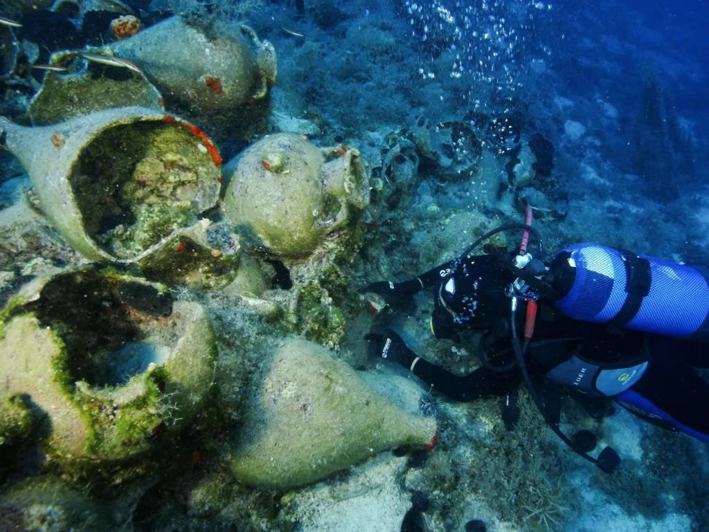 Diver measures Samian amphora